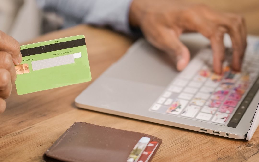 Why switch direct debit providers for businesses: bookkeeper reconciling Direct Debit payouts against invoices