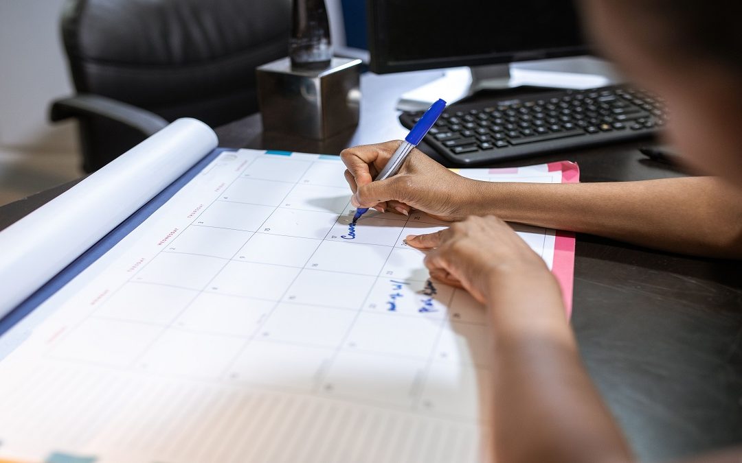 Define debtors and creditors in practice: unpaid invoices marked overdue on a small business desk